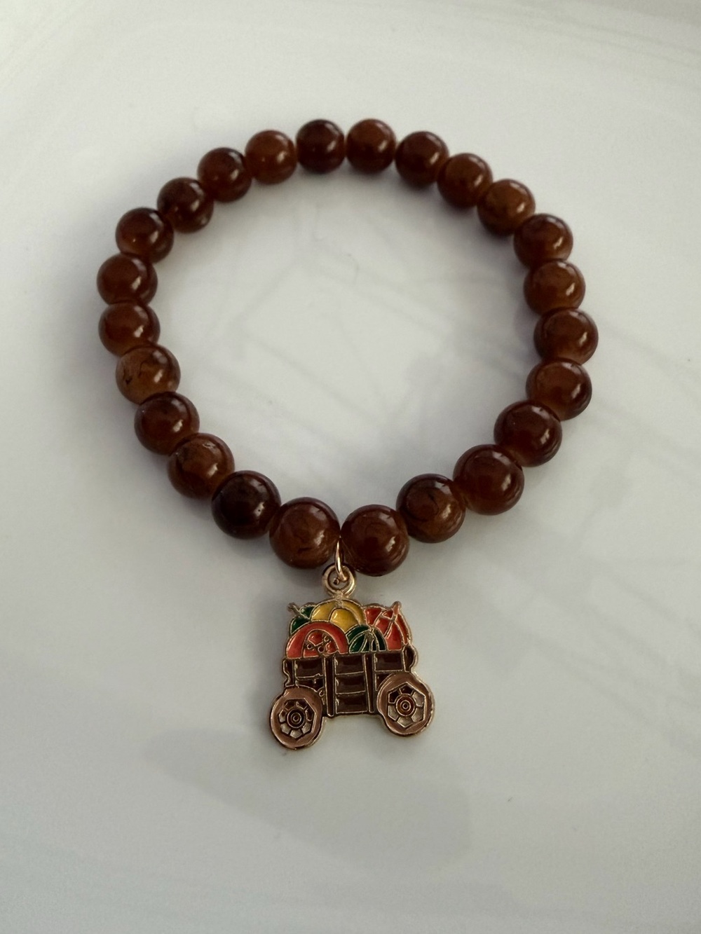 Brown Beaded Bracelet with Fruit Cart Charm